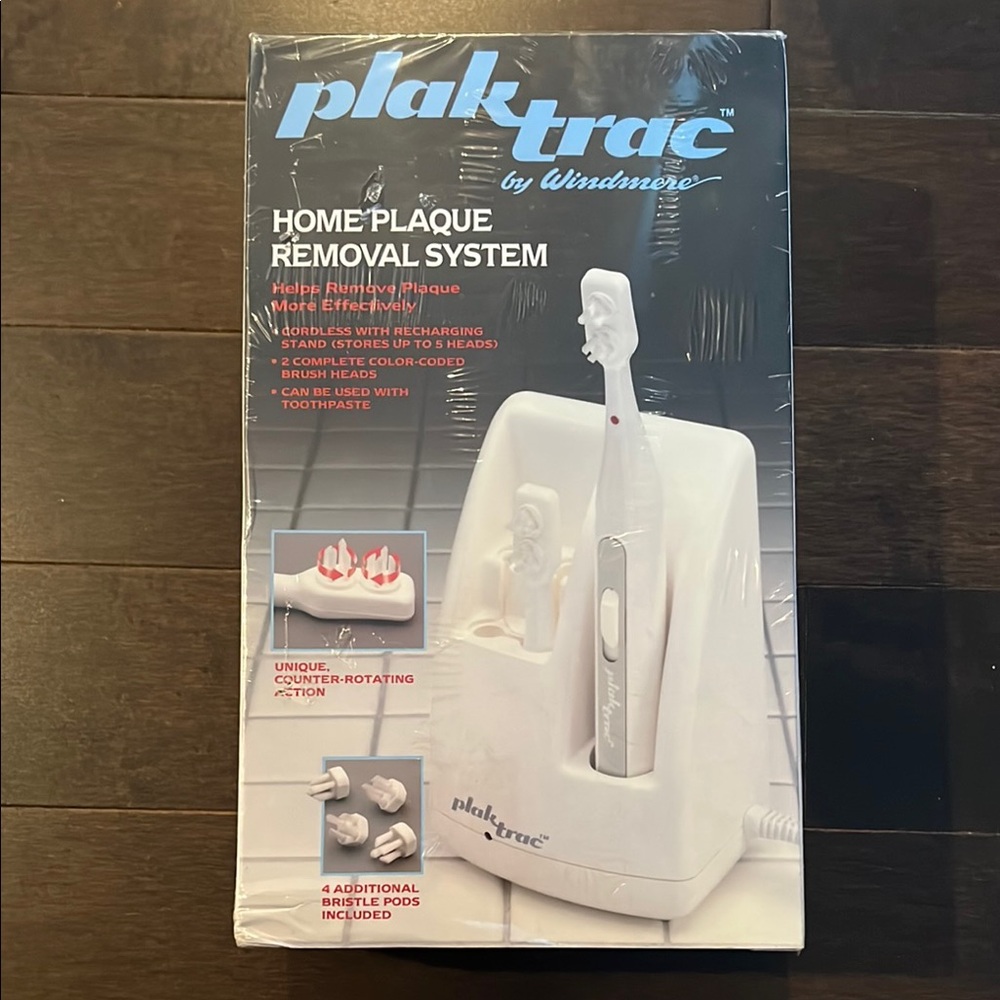 New in box Plaktrac Home Plaque Removal System-cordless rechargeable stand